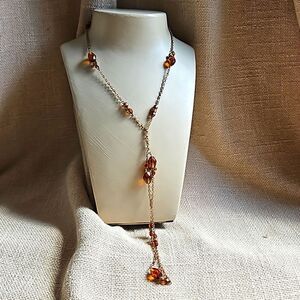 Long 33" Faceted Amber Glass Bead & Gold Bow Necklace